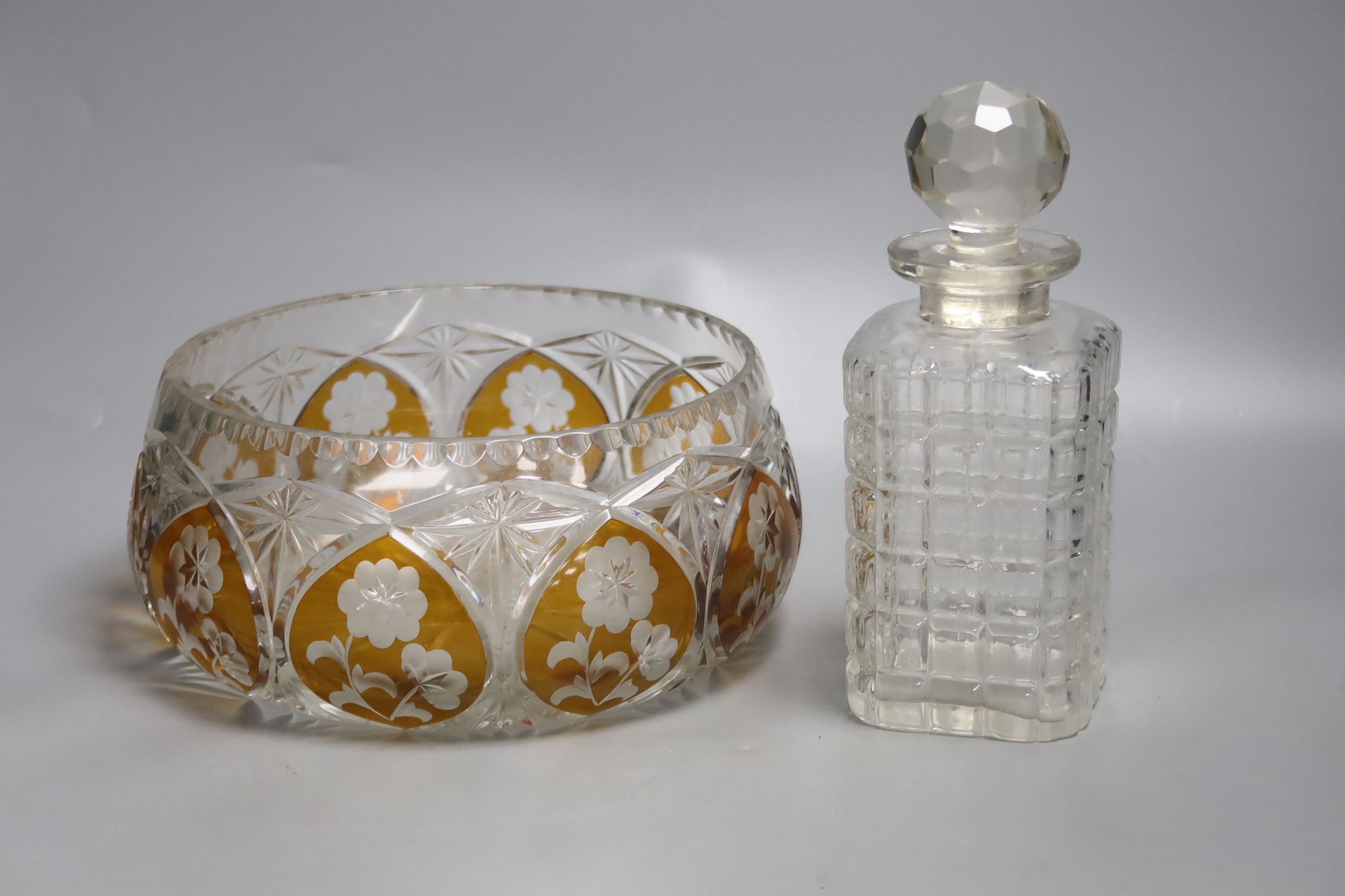 A small collection of cut and moulded glassware including a Murano amber flash cut fruit bowl